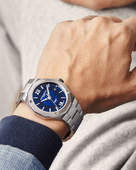 Riviera 10616 42mm Steel Case, Dodecagonal Steel Bezel, Exhibition Back, Automatic, Blue Dial, Steel Bracelet