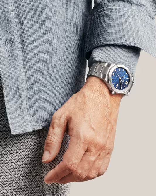 Riviera 10620 42mm Steel Case, Dodecagonal Steel Bezel, Exhibition Back, Automatic, Blue Dial, Steel Bracelet